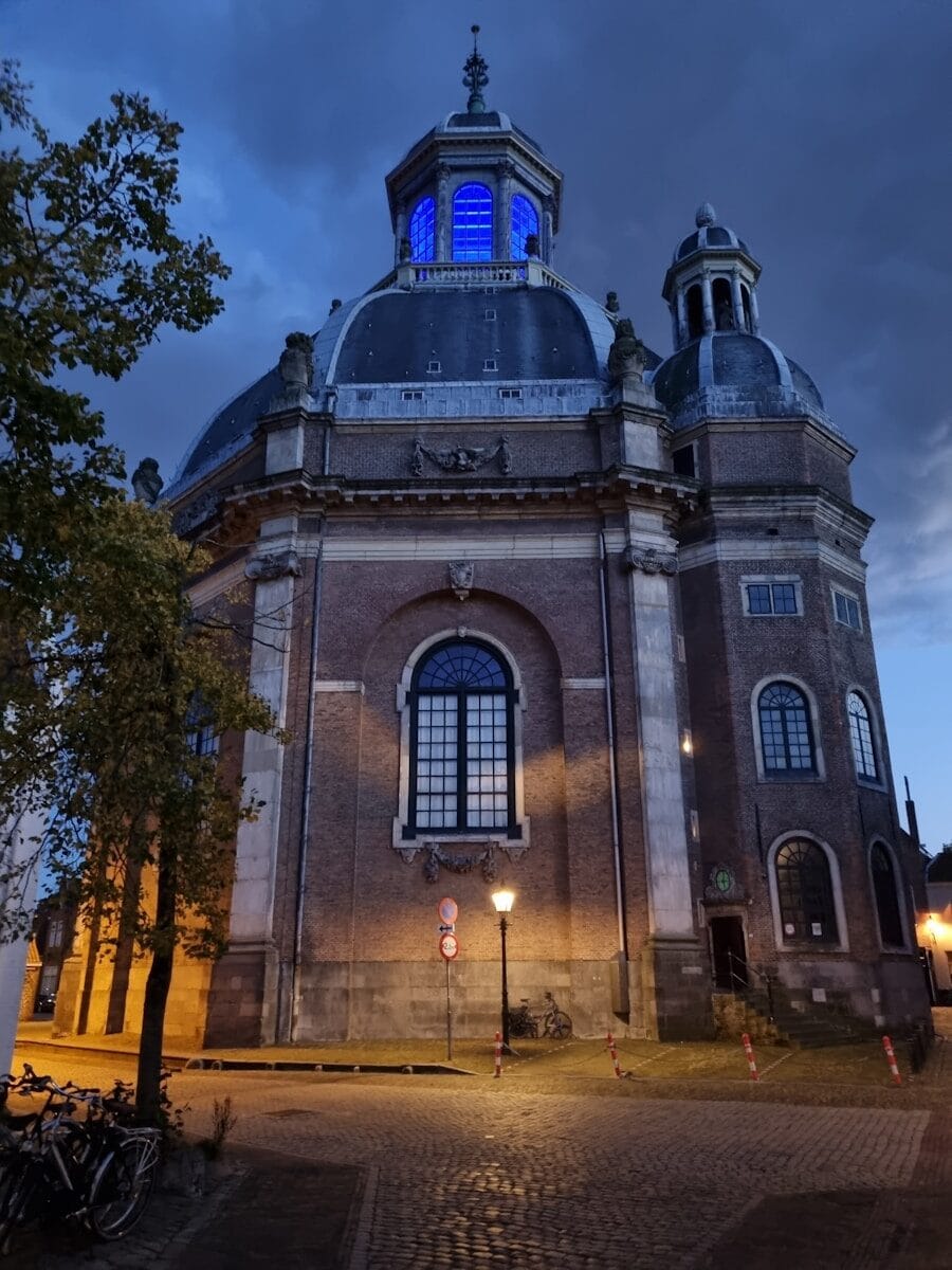 a large building with a clock on the top of it